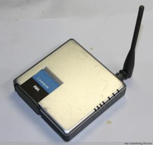 Thumbnail for the Linksys WRH54G router with 54mbps WiFi, 4 100mbps ETH-ports and
                                         0 USB-ports