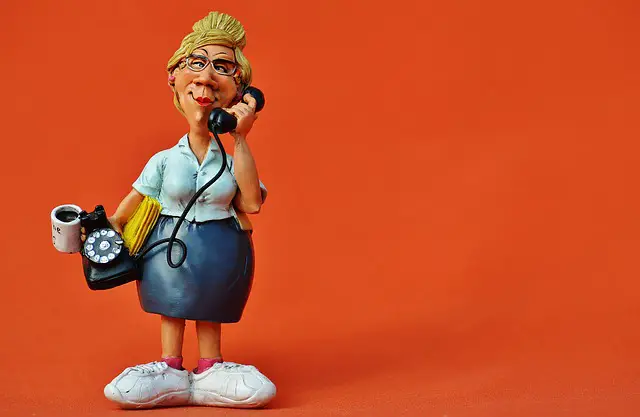 woman calling using vintage phone