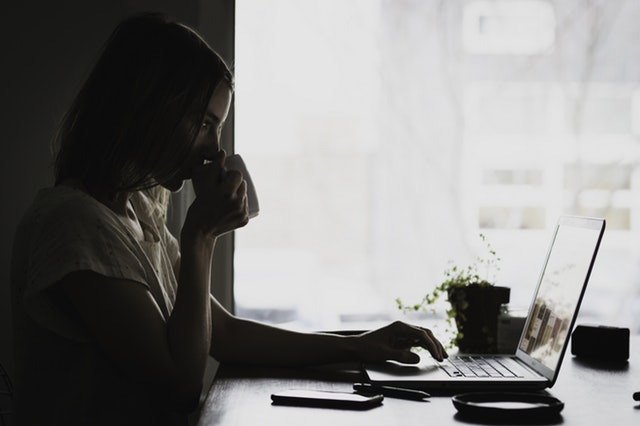 a woman browsing internet at home