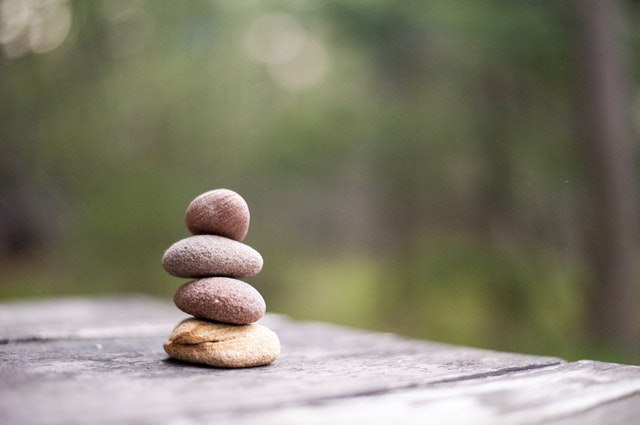 balancing four rocks