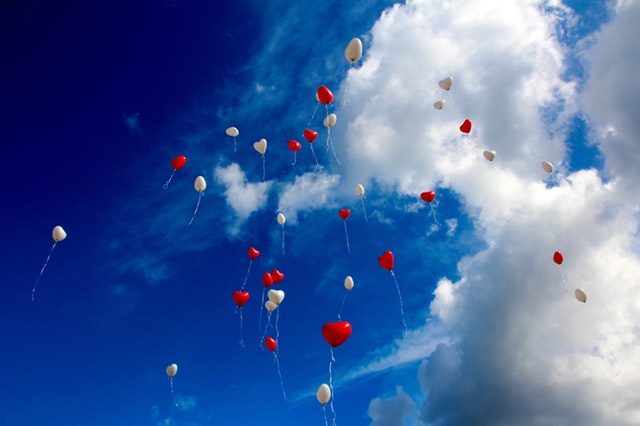 ballons rising up to the sky