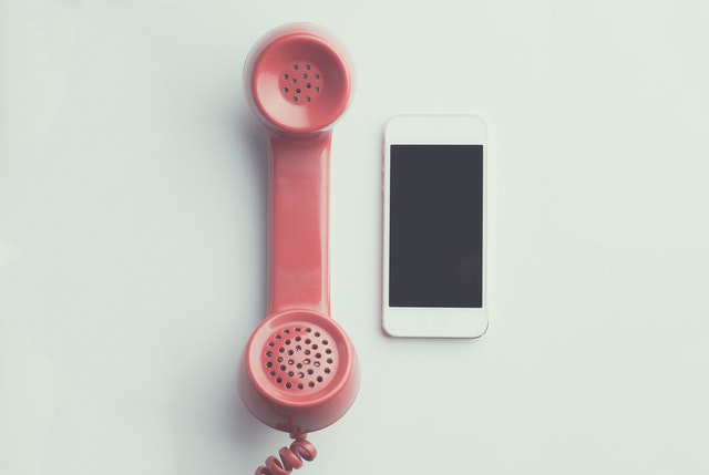 vintage phone and smartphone on a table