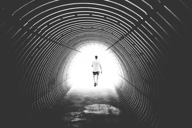 a tunnel in black and white