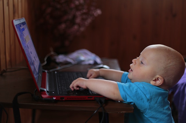 baby using a laptop