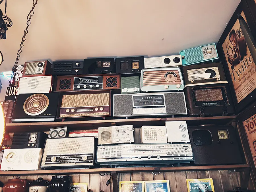 Old radio and speakers on the cabinet