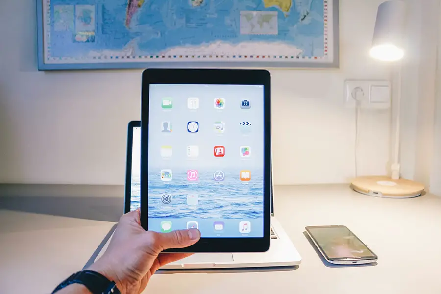 A man holding an iPad